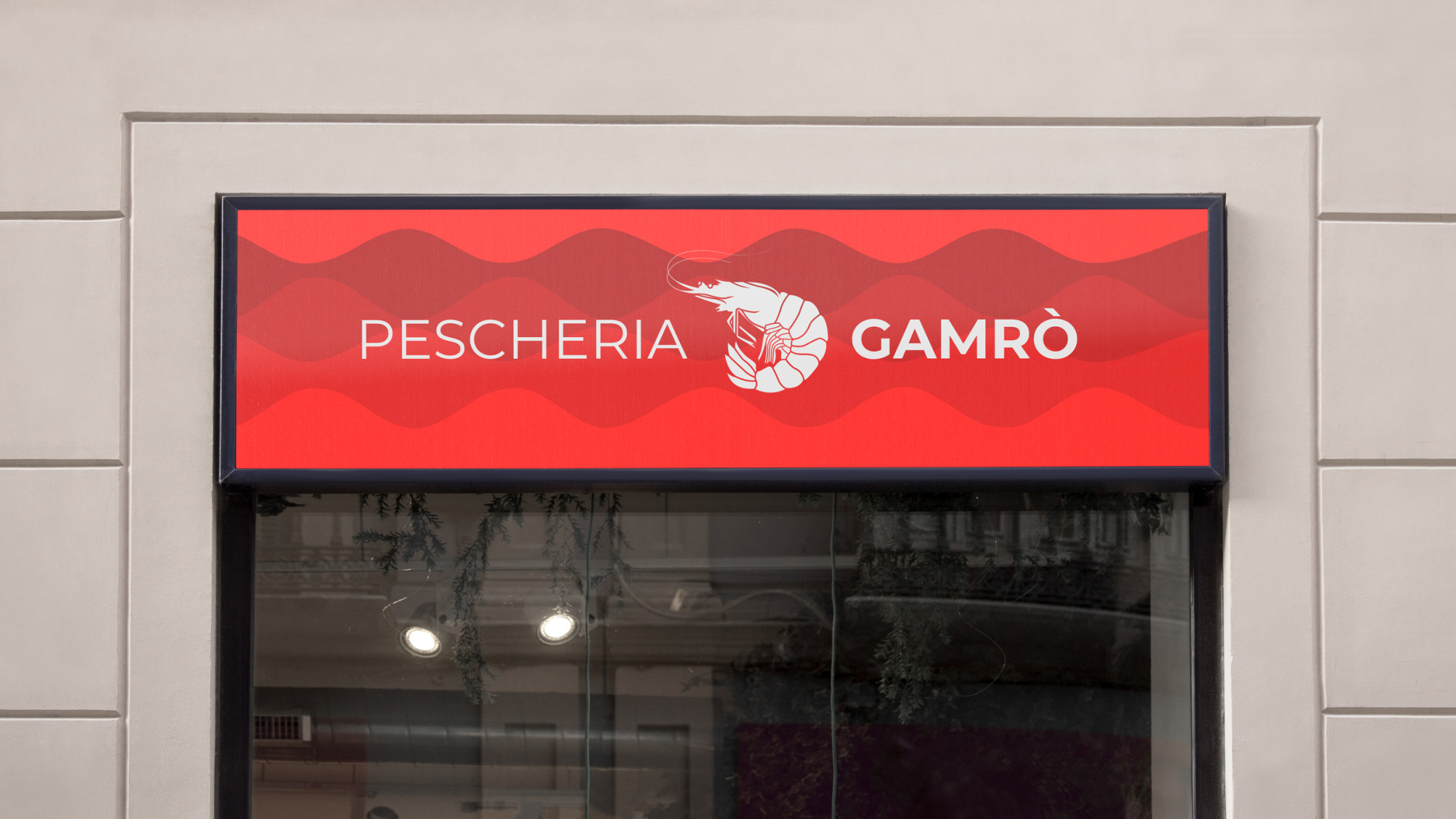 Mockup dell’insegna Pescheria Gamrò con onde rosse e marchio bianco